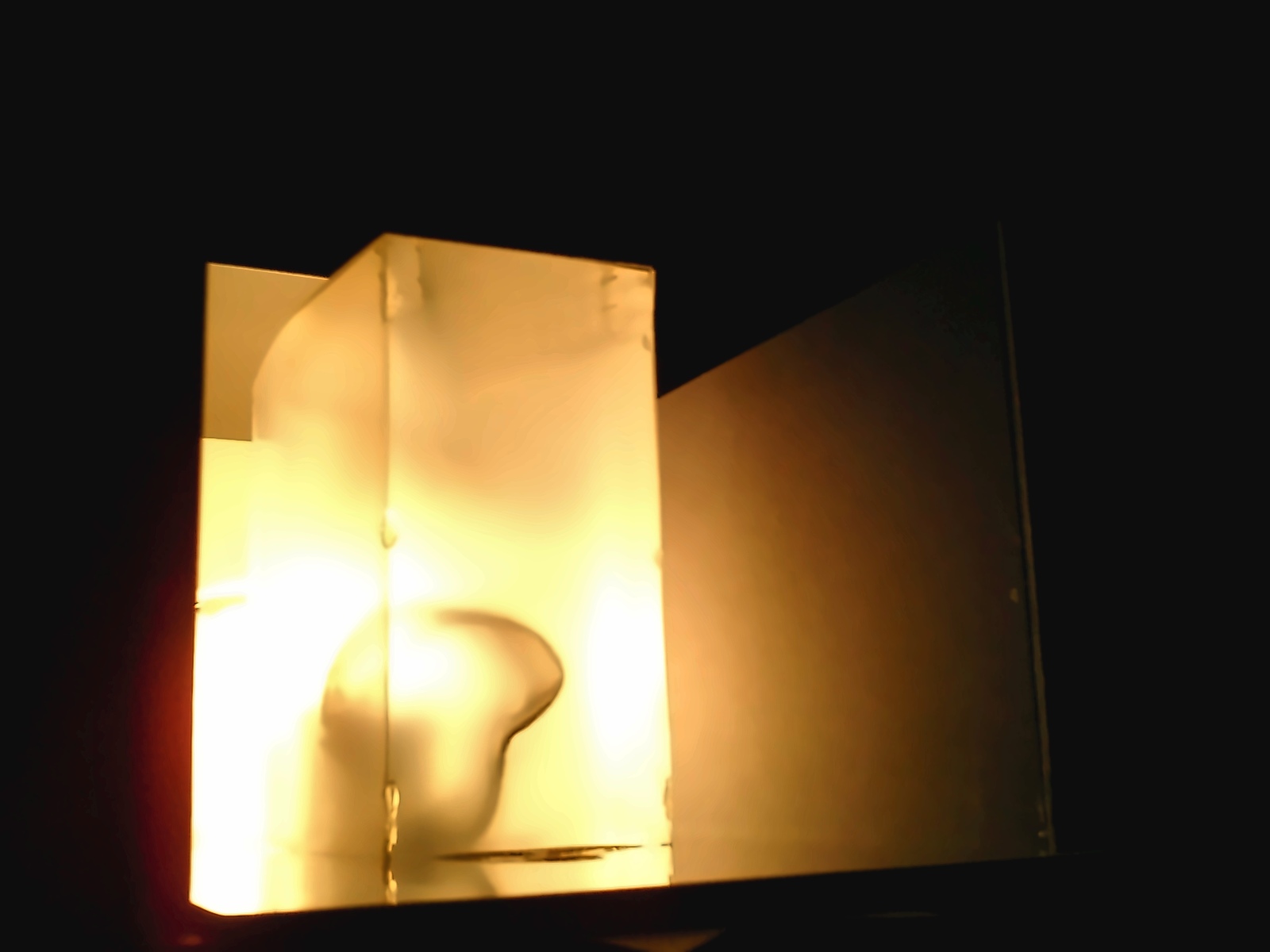 Nir Sivan Architects – Beyond the Gaze, sculpture (2004): the translucent box lit from inside, the Iris element showing as a shadow