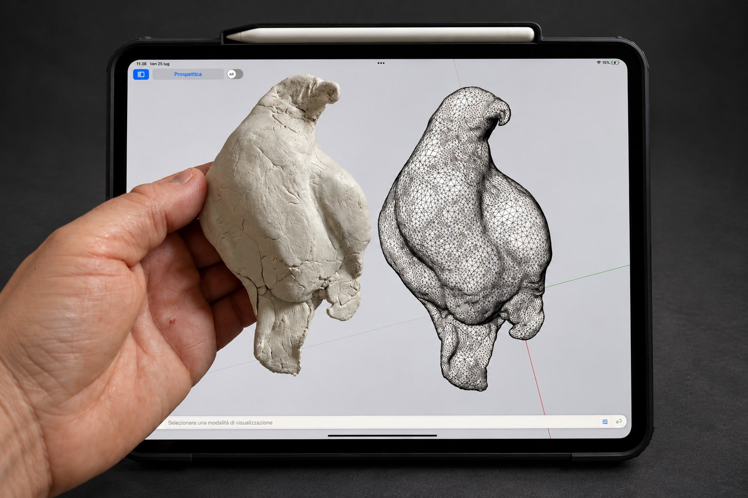 Nir Sivan Architects – Falcon, Vision in Flight (2025): the clay falcon held next to its 3D scan on a tablet