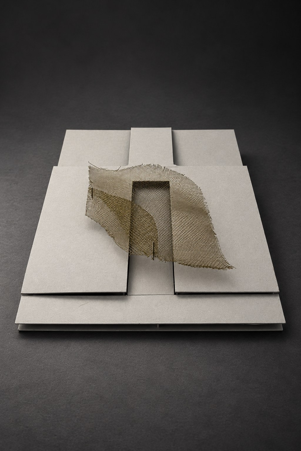 Nir Sivan Architects – Metal mesh study for Onda Carioca (2011): the mesh wave between the cardboard buildings of the site model