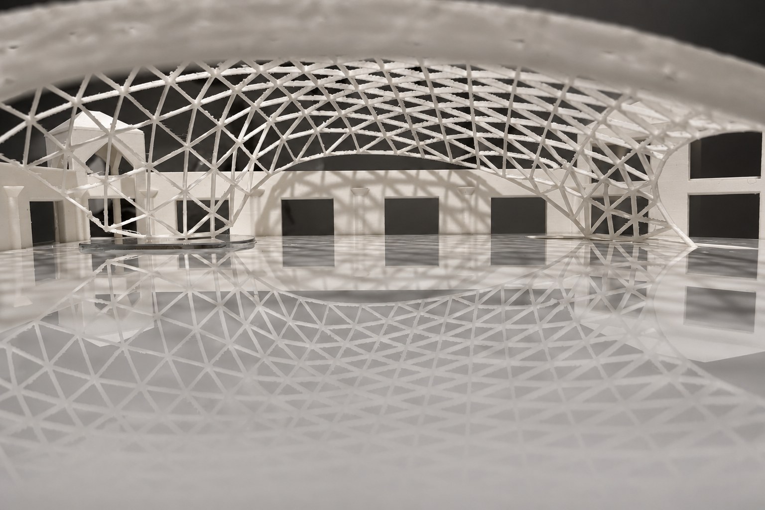 Nir Sivan Architects – 3D-printed model of the REUT Heart gridshell canopy (2025): inside the site model, under the lattice
